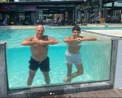 He enjoys swimming in his free time.